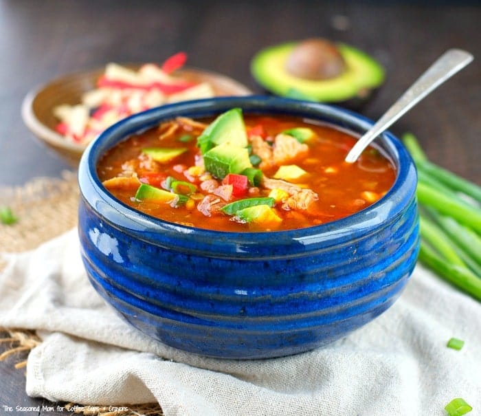 You only need 10 minutes to prepare this Slow Cooker Chicken Enchilada Chili, which simmers in the Crock Pot all day for a convenient and easy weeknight dinner! 