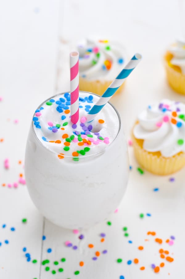 Healthy smoothie topped with rainbow sprinkles