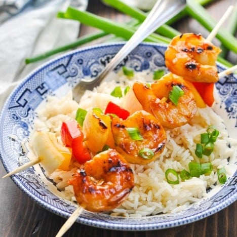 Easy grilled shrimp recipe with vegetables on a bowl of rice