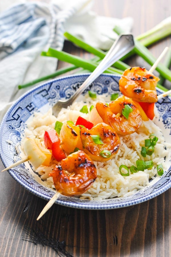 Easy grilled shrimp recipe with vegetables on a bowl of rice