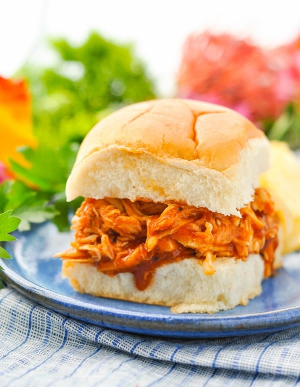 Pulled BBQ Chicken sandwich on a blue plate