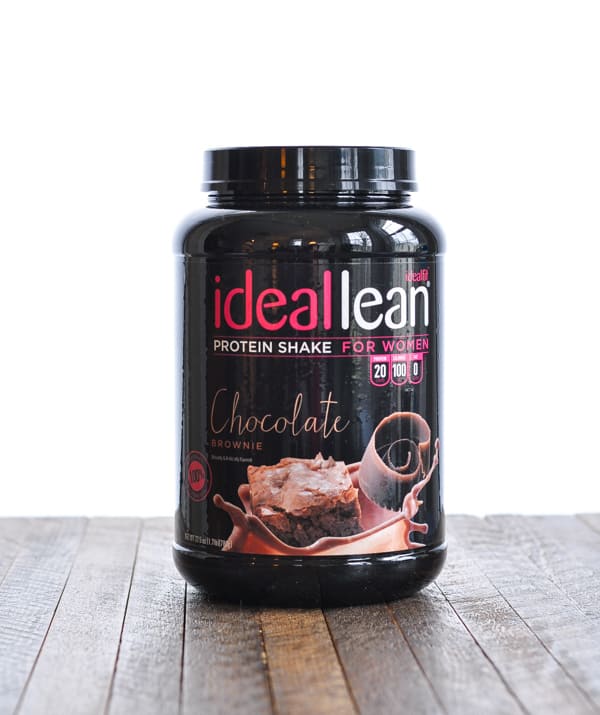 Container of IdealLean Chocolate protein powder for protein shake