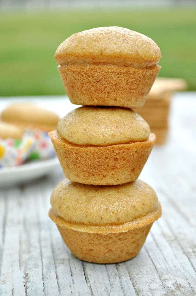 A close up of three Graham Cracker Blender Muffins stacked on top of each other