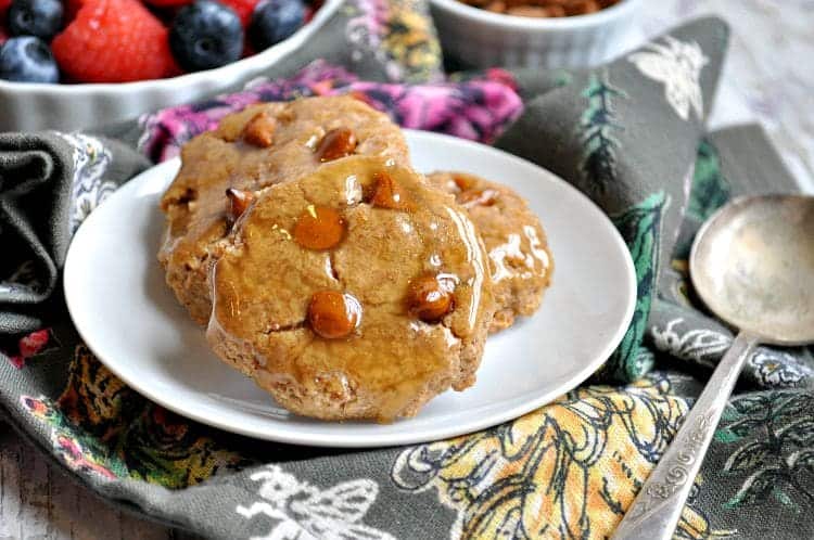 Glazed Honey Bun Breakfast Cookies on a plate with cinnamon chips