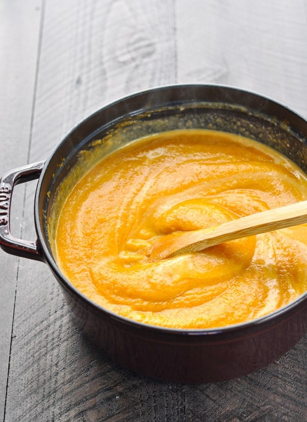 Stirring pot of easy pumpkin soup