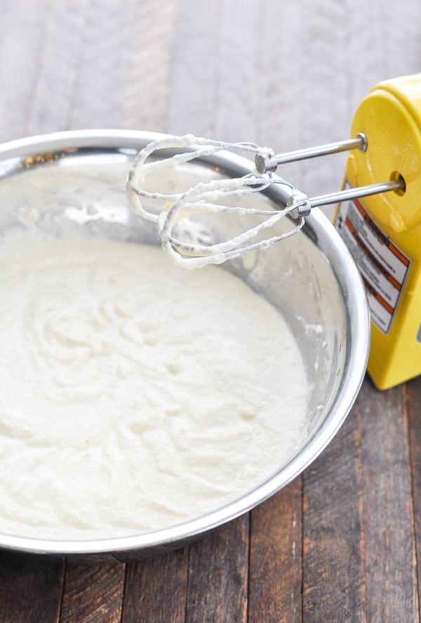 Ricotta mixture with electric mixer in large bowl
