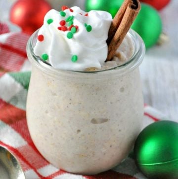 eggnog overnight oats topped with cream