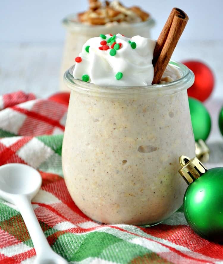A glass jar filled with high protein eggnog overnight oats