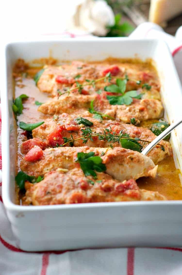 A casserole dish filled with Italian baked chicken