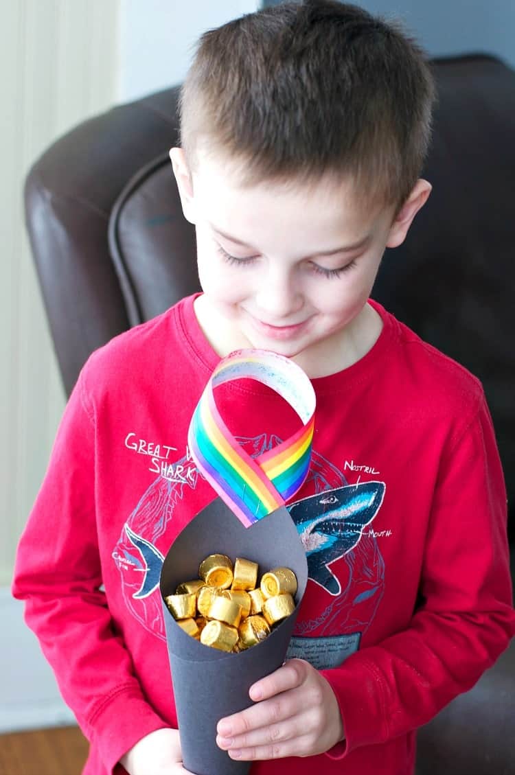 Try this easy St. Patrick's Day Activity for Kids: Lucky Pots of Gold! Hang them on a chair or doorknob and let the leprechauns "fill" them overnight!