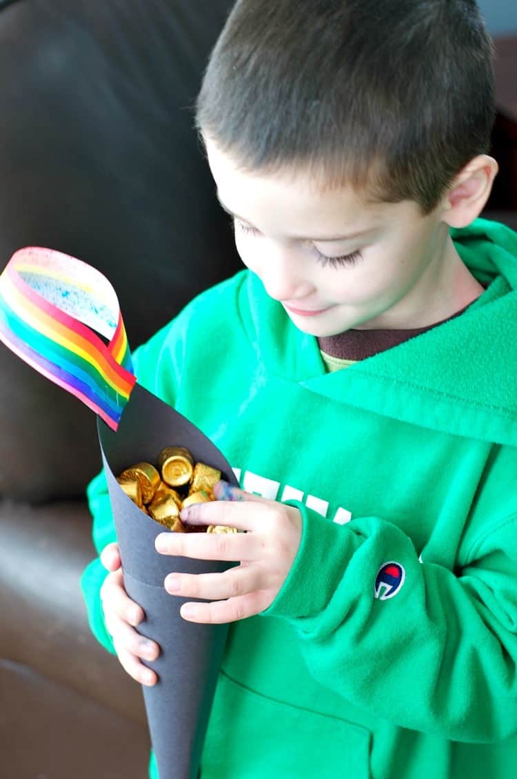 Try this easy St. Patrick's Day Activity for Kids: Lucky Pots of Gold! Hang them on a chair or doorknob and let the leprechauns "fill" them overnight!