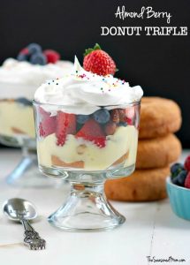 A close up image of an almond berry donut trifle