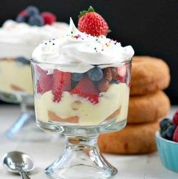 A close up image of an almond berry donut trifle