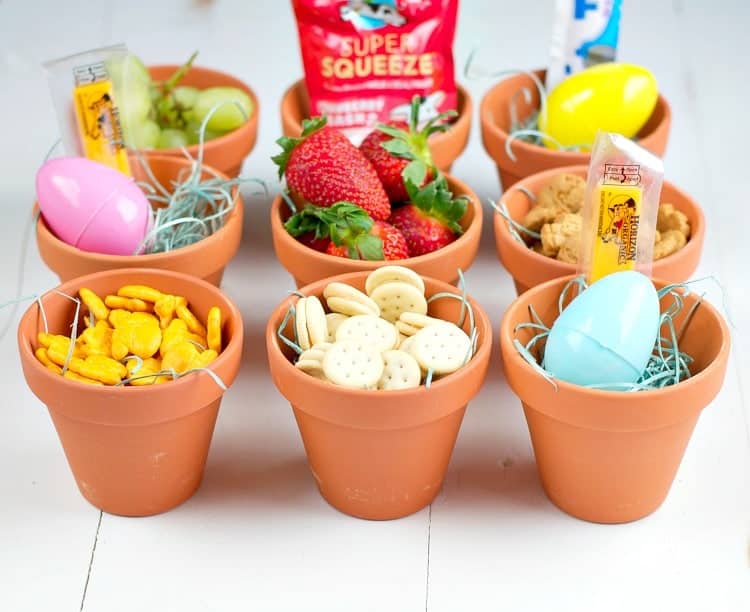 An Easter Egg Snack Toss is an easy Easter Game for Kids -- and it will keep the youngsters active and energized throughout the holiday!