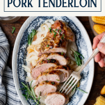 Hands serving roasted pork tenderloin with a fork on a tray with text title box at top.
