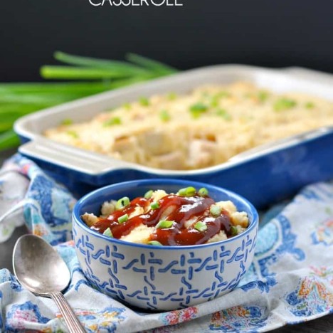 A chicken and grits casserole in a blue bowl