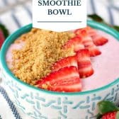 Strawberry cheesecake smoothie bowl with text title overlay.