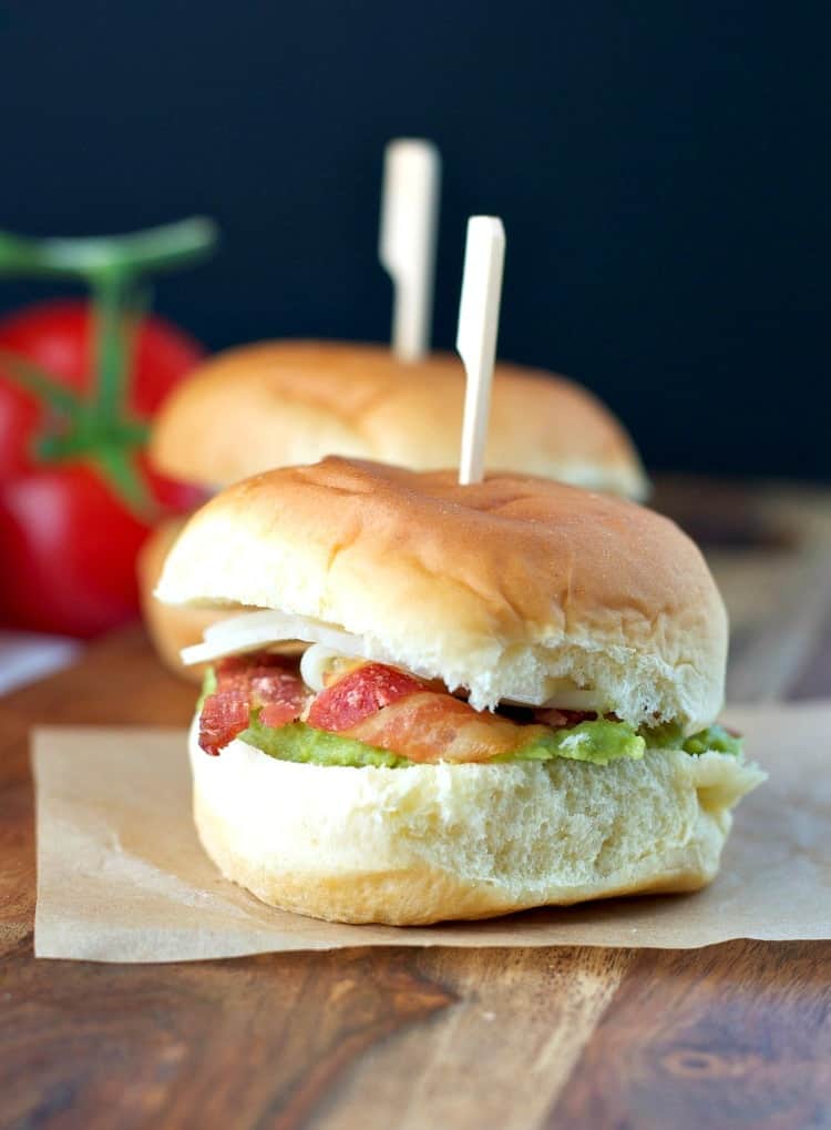 A picnic sandwiched filled with avocado and bacon