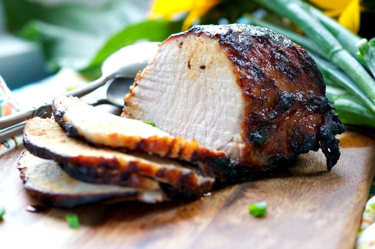 A close up of Balsamic Glazed Pork Loin cut into slices