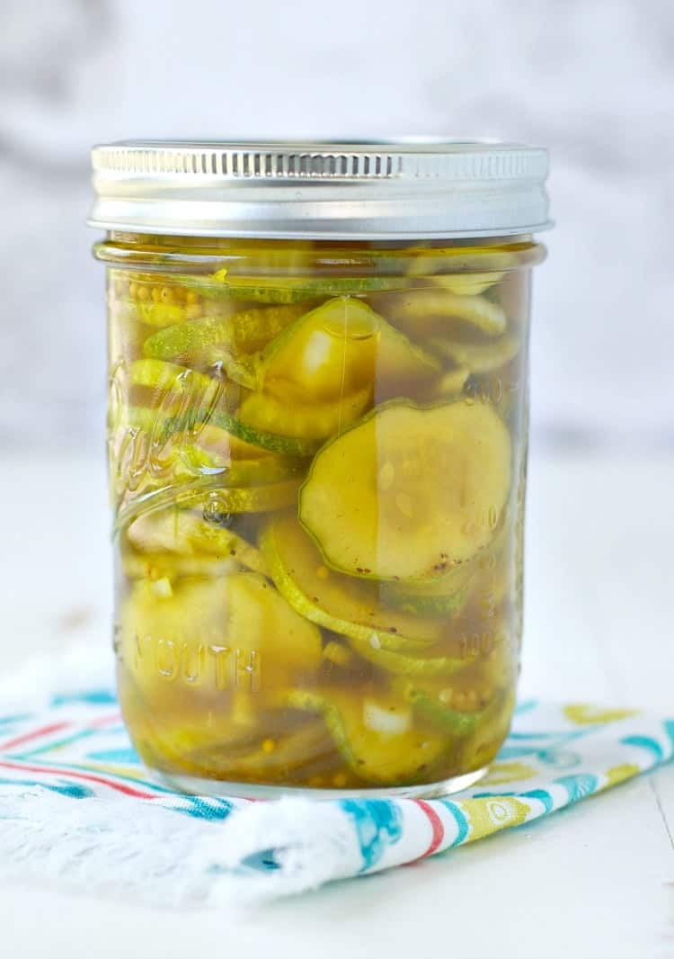 There's no fancy canning necessary! With just a few minutes of hands-on time, you can have fresh, sweet, and tangy Lower Sugar Bread and Butter Refrigerator Pickles ready to enjoy. This clean eating snack is perfect for adding to salads, stuffing inside sandwiches, or enjoying on its own!