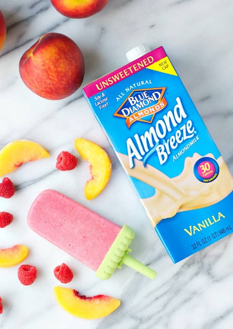 Sweetened only with fruit, these Peach Melba Homemade Pops are a perfect healthy snack, breakfast, or dessert! For less than 40 calories, you can enjoy the cool and creamy blend of peaches, raspberries, and vanilla in a simple, 5-minute treat that's loaded with nutritious, clean eating ingredients!