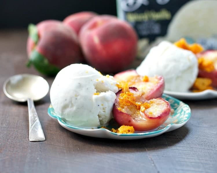 Indulge in summer's fresh bounty with a simple and easy dessert: Roasted White Peaches with Honeycomb and Vanilla Ice Cream! 