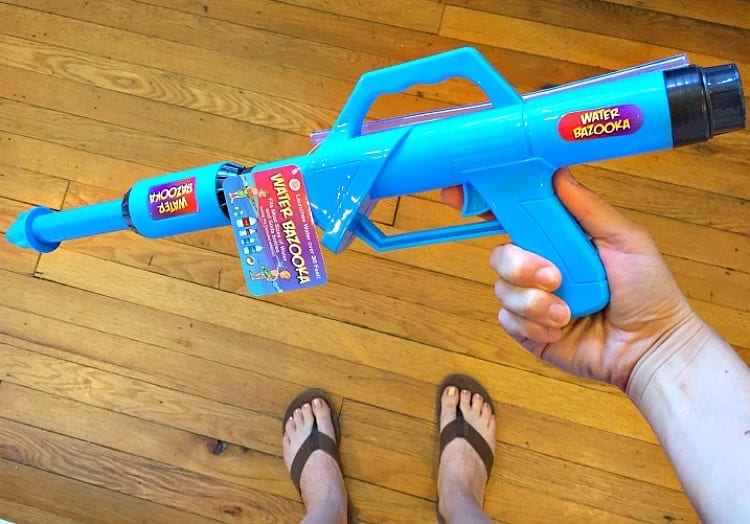 Have a BLAST with this fun outdoor activity for kids! My boys loved Painting with Water Guns while aiming at a target. It's truly the perfect summertime entertainment!
