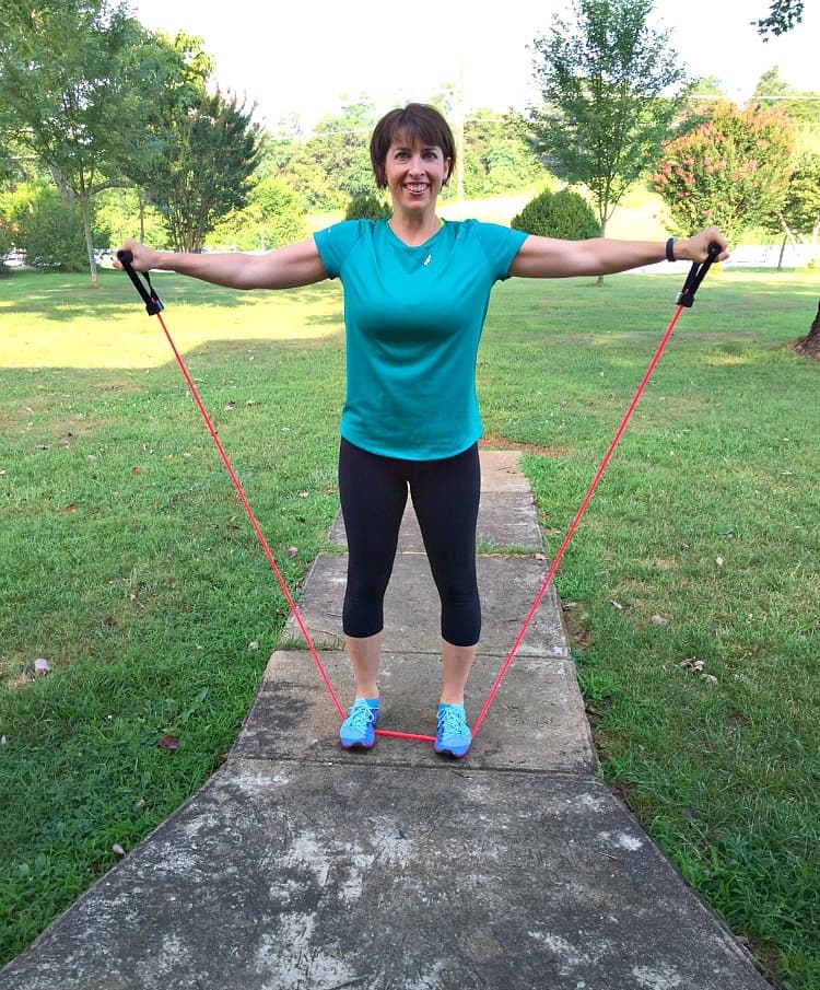 This Low Impact Resistance Band Workout combines cardio and strength training for a total body exercise routine that you can do almost anywhere -- in just 20 minutes!