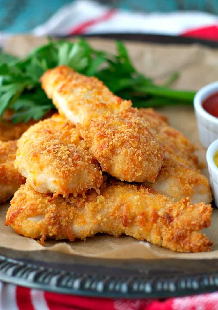 A small pile of Baked Chicken Tenders on a plate