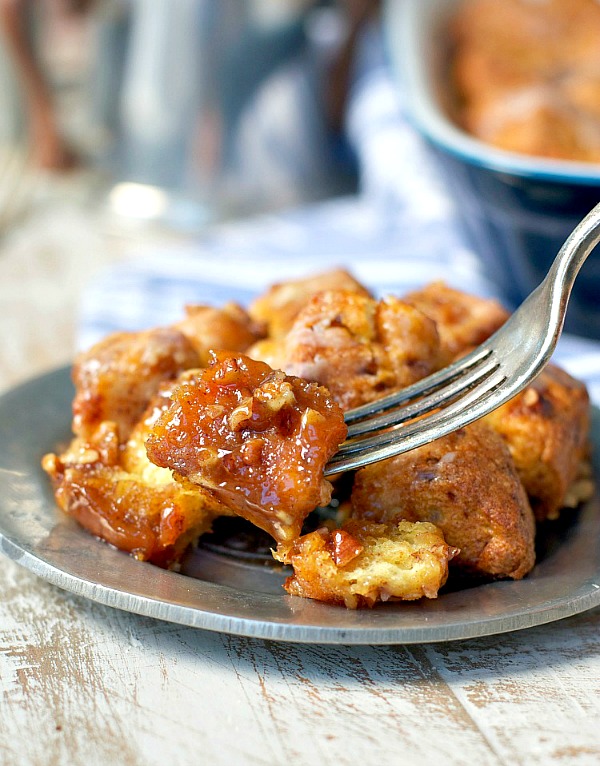 Close up shot of bite of monkey bread on a fork