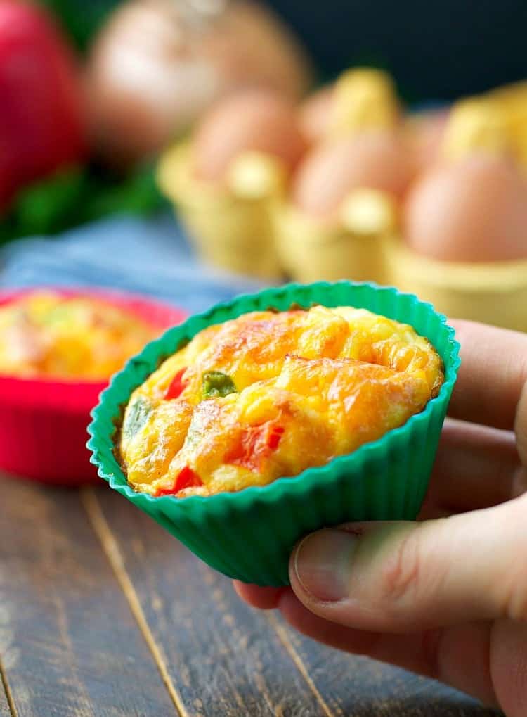 A close up of omelet egg muffins on a wooden surface