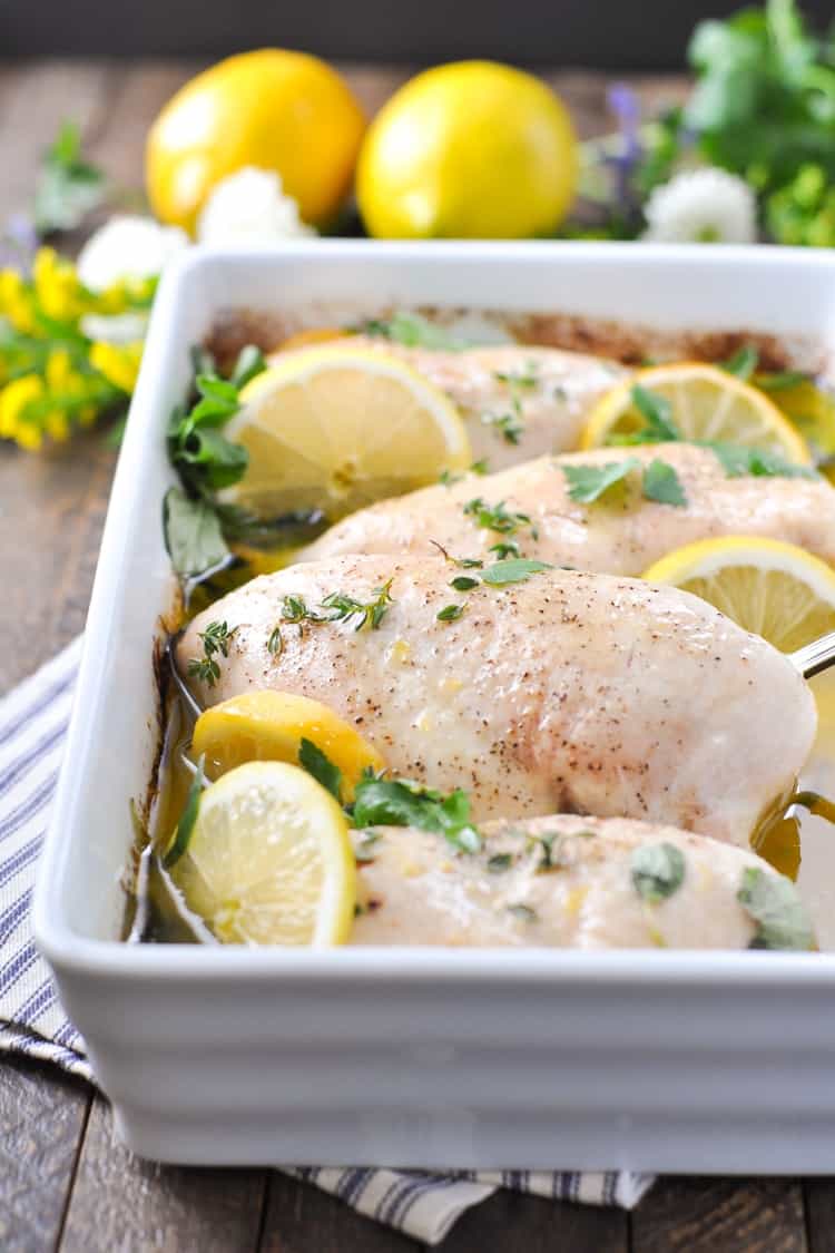 A white tray of Garlic and Lemon Chicken