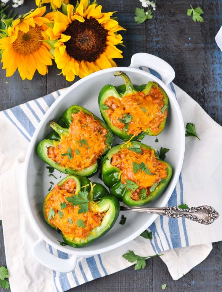 An overhead shot of Amish stuffed green peppers in a casserole dish