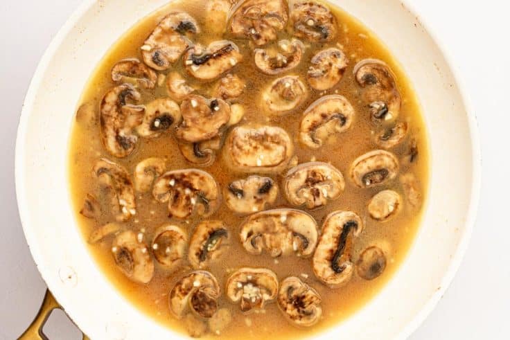 Marsala sauce in a skillet.