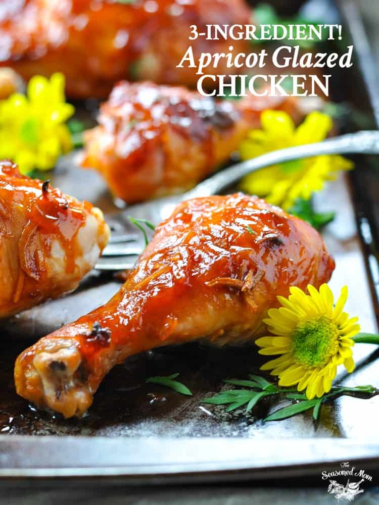 A close up of apricot glazed chicken on a baking sheet