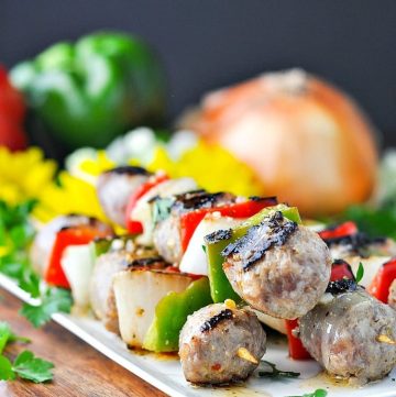 A side shot of Italian sausage kabobs