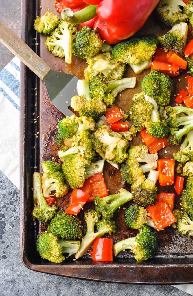 An overhead shot of oven roasted broccoli with peppers