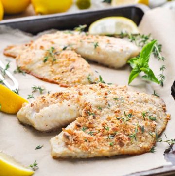 A close up of baked Tilapia on a baking tray