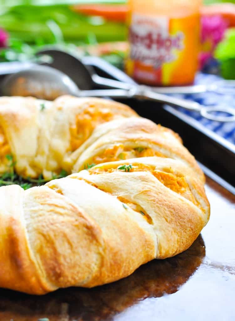 A side shot of a buffalo chicken dip crescent ring
