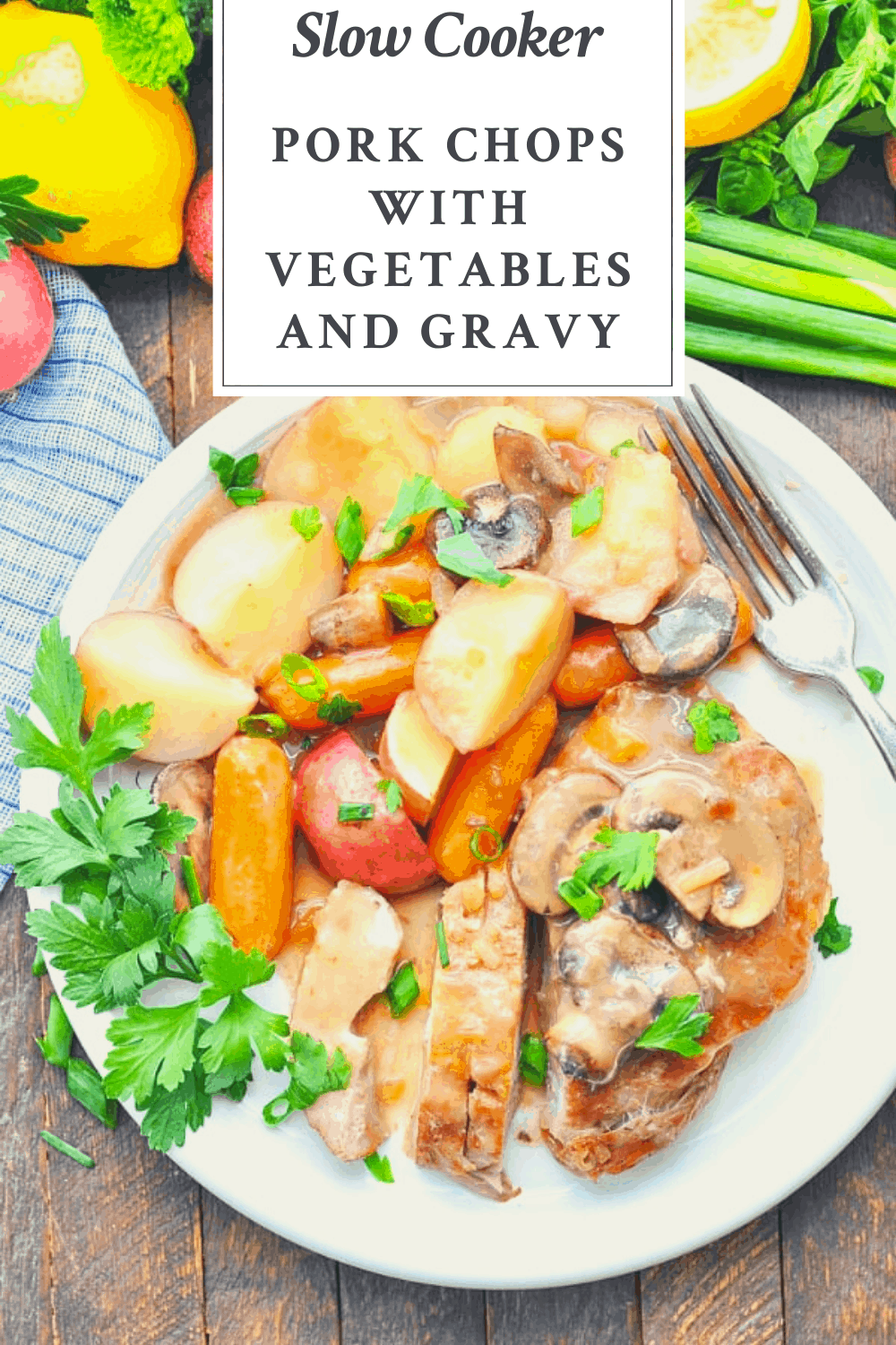 Overhead image of a plate of slow cooker pork chops with gravy and text title box at the top