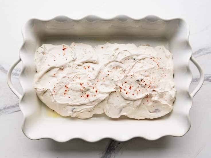 Process shot showing how to make cream of mushroom chicken.