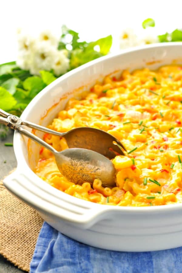 Close image of Dump and Bake Chicken Mac and Cheese casserole in a white baking dish
