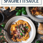 Overhead image of two bowls of spaghetti sauce from scratch with text title box at top