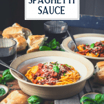 Side shot of two bowls of homemade spaghetti sauce with text title overlay