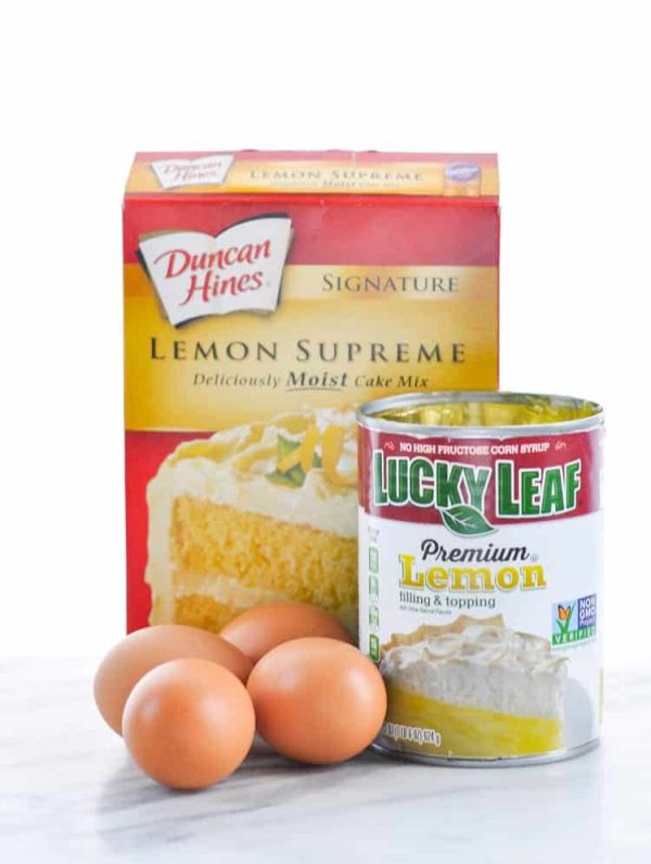 The three ingredients for easy lemon bars -- lemon cake mix, lemon pie filling, and eggs.