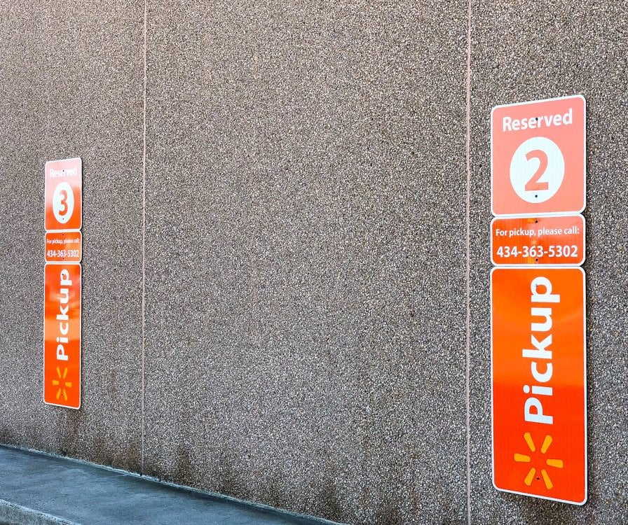 A photo of Reserved parking spots for online Walmart grocery orders