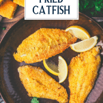 Close overhead shot of a pan of crispy fried catfish with text title overlay