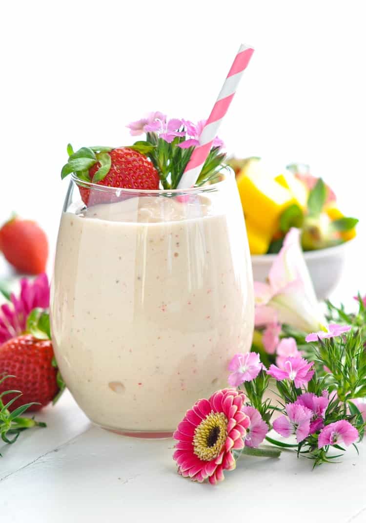 Close image of high protein and dairy free vegan Healthy Strawberry Smoothie in a glass