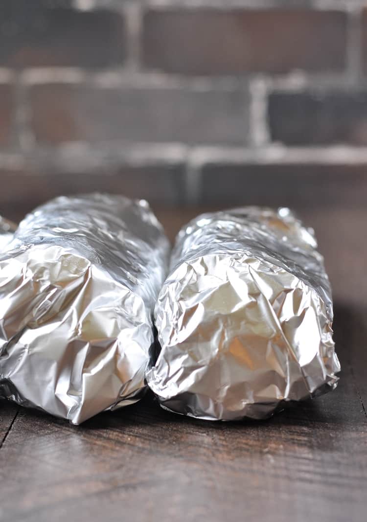 Burritos wrapped in foil for freezer friendly meal prep