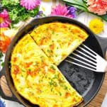 Overhead shot of easy frittata baked in a cast iron skillet